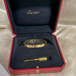 Cartier Bracelet
	•	Size: 16
	•	Material: Yellow Gold